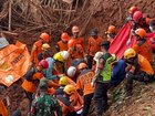 Hundreds of rescuers continue to look for the missing after a landslide in Central Java.