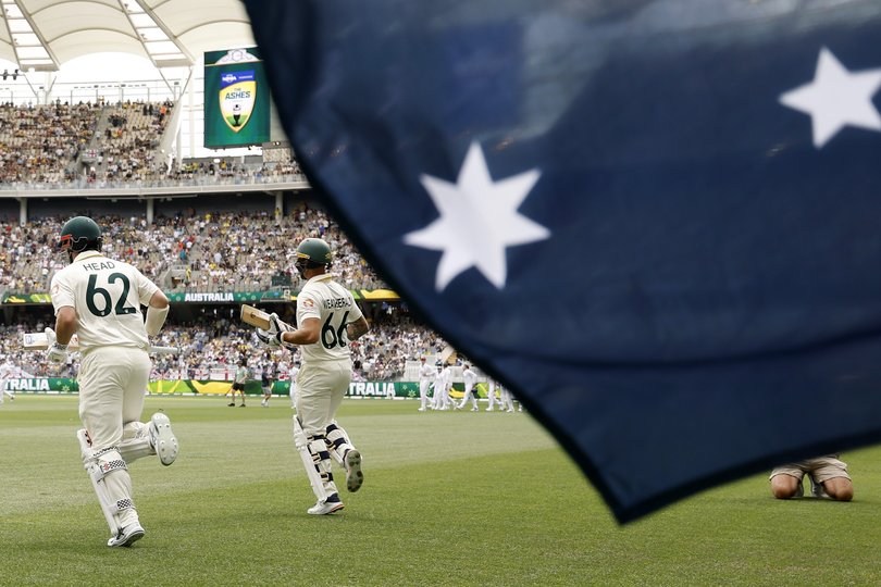 Travis Head and Jake Weatherald head to the middle.