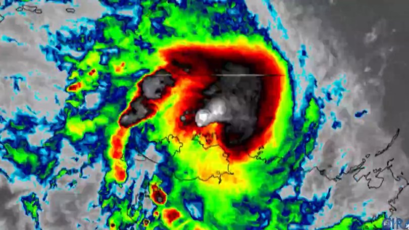The first cyclone of the season has strengthened and is starting to hammer the Top End, with residents advised to shelter at home and stay put.