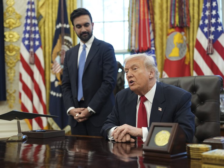 President Donald Trump speaks as New York Mayor-elect Zohran Mamdani stands beside him in the Oval Office of the White House in Washington, on Friday, Nov. 21, 2025. (Eric Lee/The New York Times)