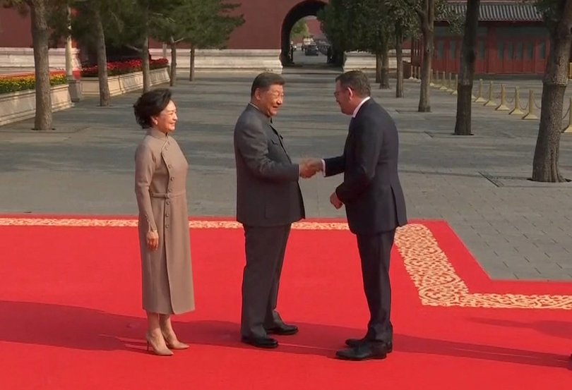 Former Victorian Premier Daniel Andrews shakes hands with Chinese President Xi Jinping in Beijing ahead of a Chinese military parade.