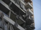 Men stand in the apartment attacked by the Israeli military on November 23, 2025 in Beirut, Lebanon.