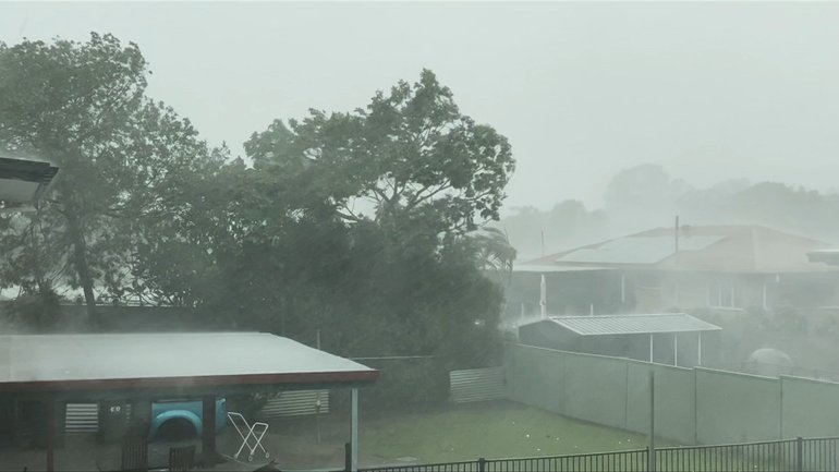 Cars and roofs take a battering with large  hailstones.