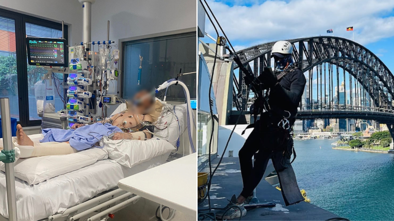 A man is fighting for life after falling from a roof while at work.