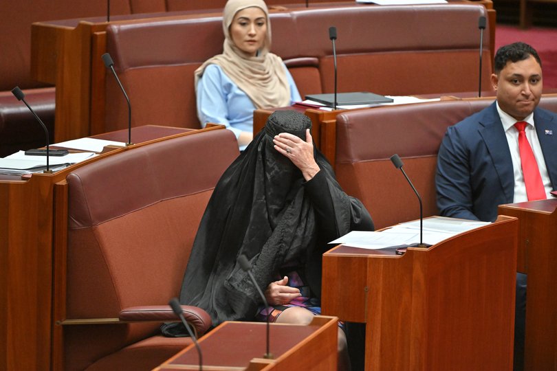 One Nation Leader Pauline Hanson wears a burqa in the Senate chamber at Parliament House in Canberra, Monday, November 24, 2025. 