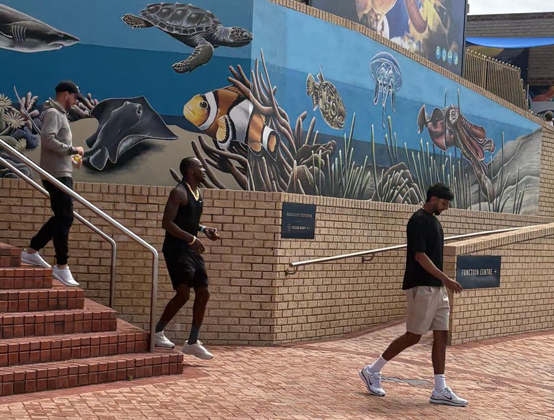 UK Cricketers Jofra Archer (middle) and Shoaib Bashir (right) leave AQWA 