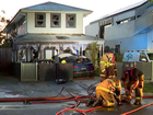 Firefighters tackle a suspected firebombing of a Melbourne home.