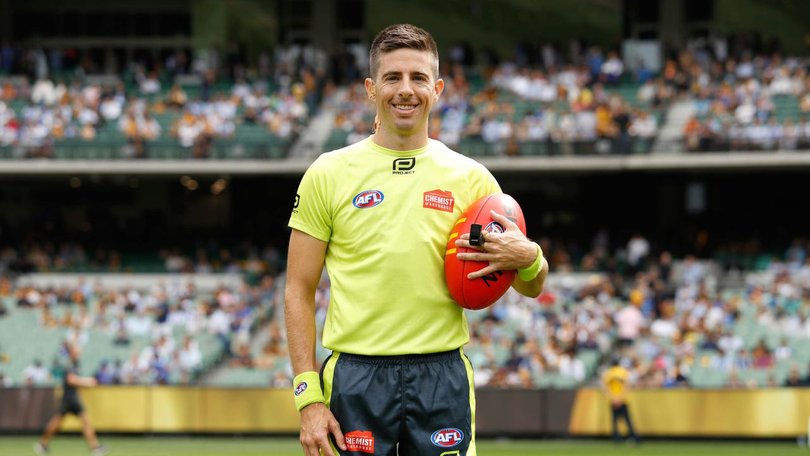 Former AFL umpire Michael Pell is among those charged. 