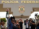Detractors of former President Jair Bolsonaro celebrate his sentence for leading a coup attempt, outside the federal police headquarters, where he is under arrest in Brasilia.