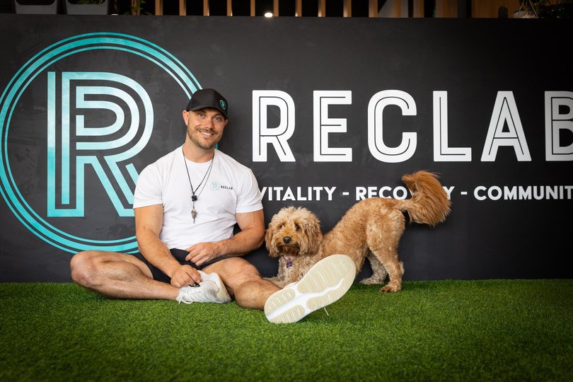 Reclab owner Pete Carbone with his dog Coco, RecLab is a contrast therapy hub with ice baths, sauna, red light therapy, Picture: Andrew Ritchie