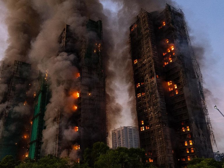 Flames spread on bamboo scaffolding that was set up around the Hong Kong housing complex. 