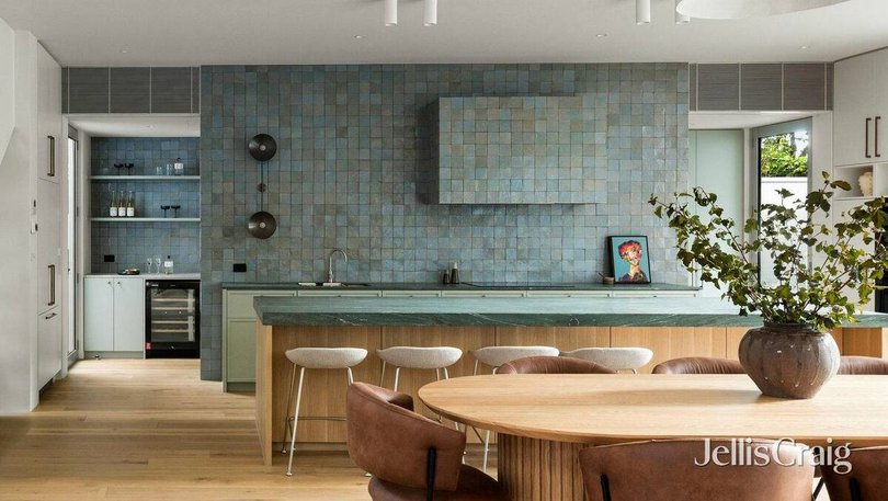 One of the most eye-catching rooms is the blue-green kitchen.