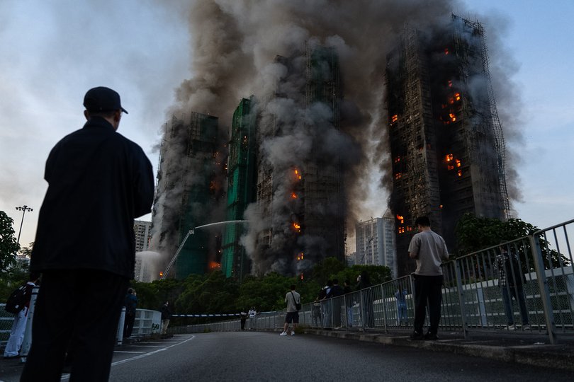 Smoke rises after a fire broke out at Wang Fuk Court.