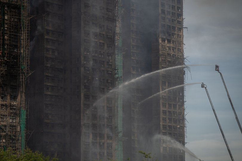 Smoke rises from a residential complex in Tai Po, Hong Kong on Nov. 27, 2025.