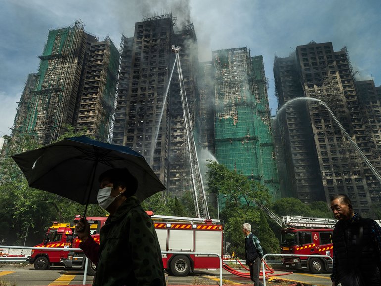 Smoke rises from a residential complex in Tai Po, Hong Kong on Nov. 27, 2025.
