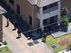 Police have swarmed a Blacktown home after gunshots were fired.