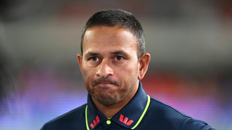 Usman Khawaja is expecting to overcome a back injury and play without painkillers in Brisbane. (Dave Hunt/AAP PHOTOS)