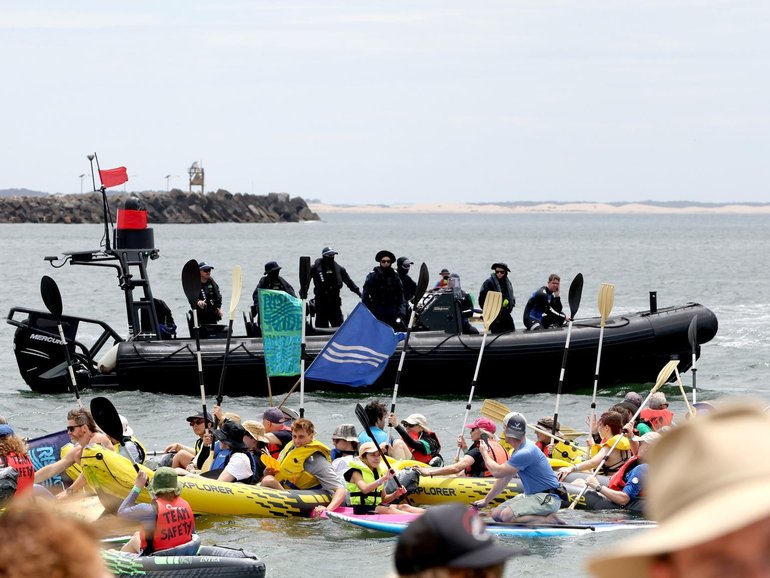 Police maintained a marine exclusion zone throughout the weekend, warning that anyone breaching the restricted area around the shipping channel could face arrest. 