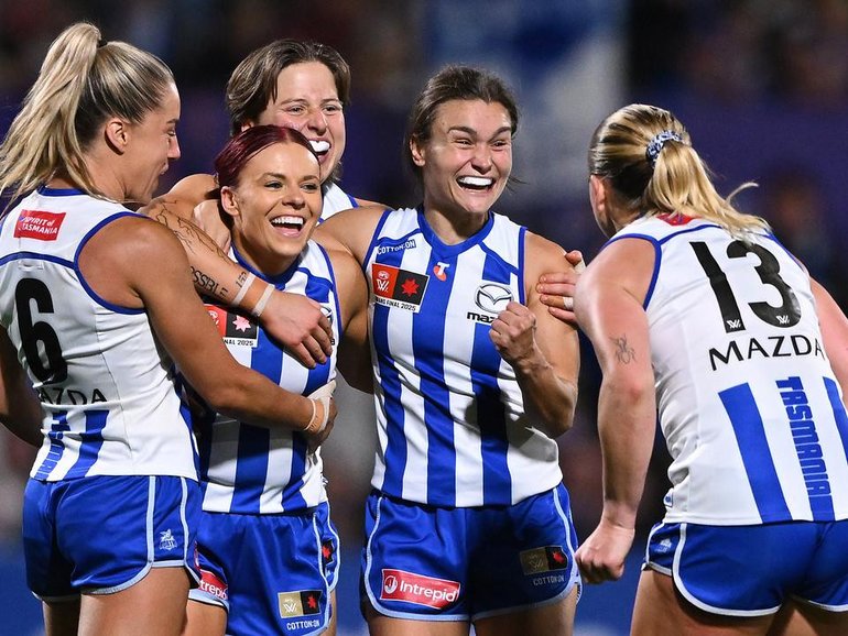 The Kangaroos capped off the perfect season by claiming their second straight AFLW premiership. (James Ross/AAP PHOTOS)