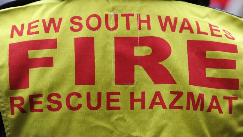 Fire and Rescue hazardous materials units are involved in tackling a fire at a chemicals factory. (Dean Lewins/AAP PHOTOS)