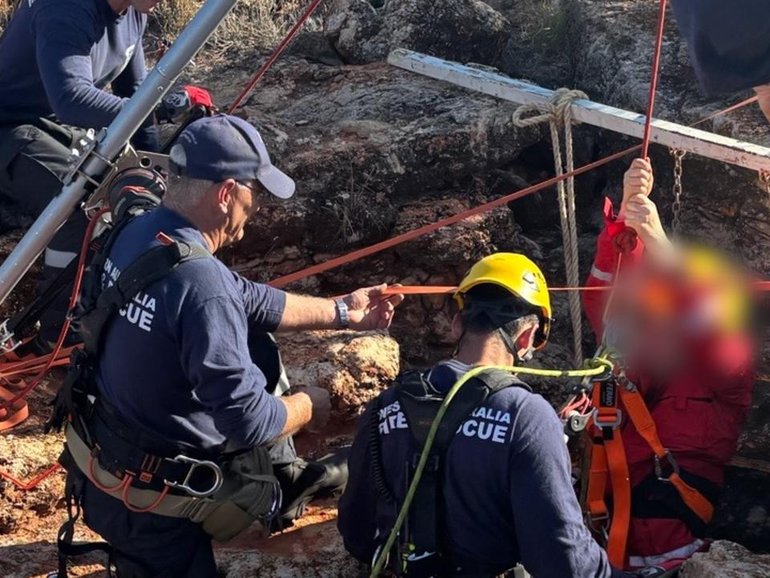 A 60-year-old woman has been rescued after falling into a cave in a remote part of the Goldfields-Esperance District near Lake Wells.