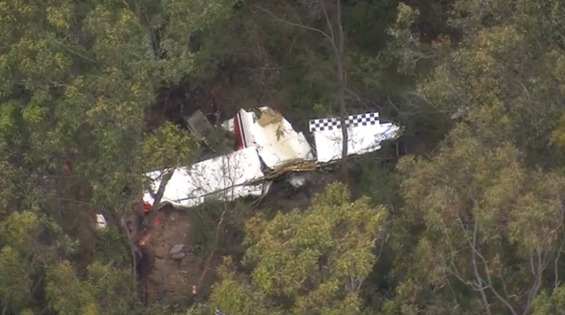 A pilot has died after two planes collided mid-air in Sydney’s southwest.