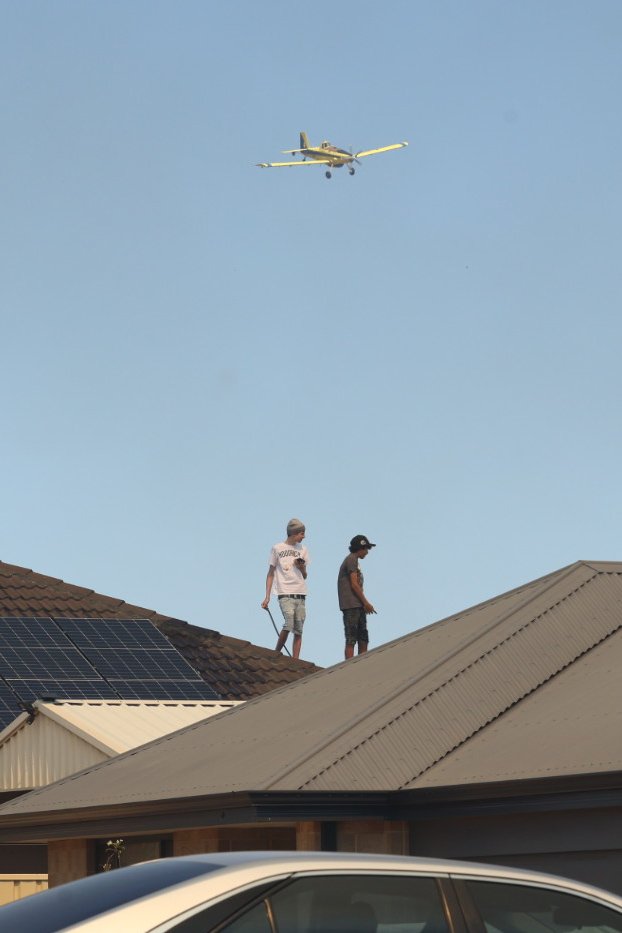 Residents seen on the roof.