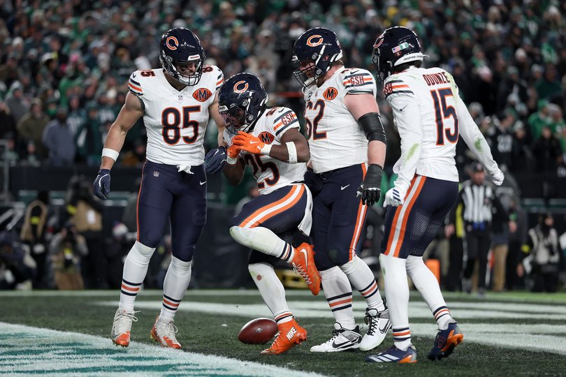 Kyle Monangai #25 of the Chicago Bears celebrates after scoring a 4 yard touchdown against the Philadelphia Eagles.