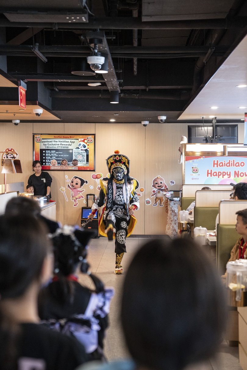 A performance inside Haidilao in the Flushing neighbourhood of Queens, October 19, 2025.