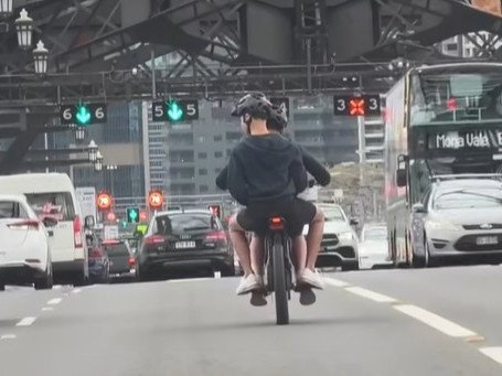 The unbelievable moment e-bike riders crossed the Sydney Harbour Bridge.
