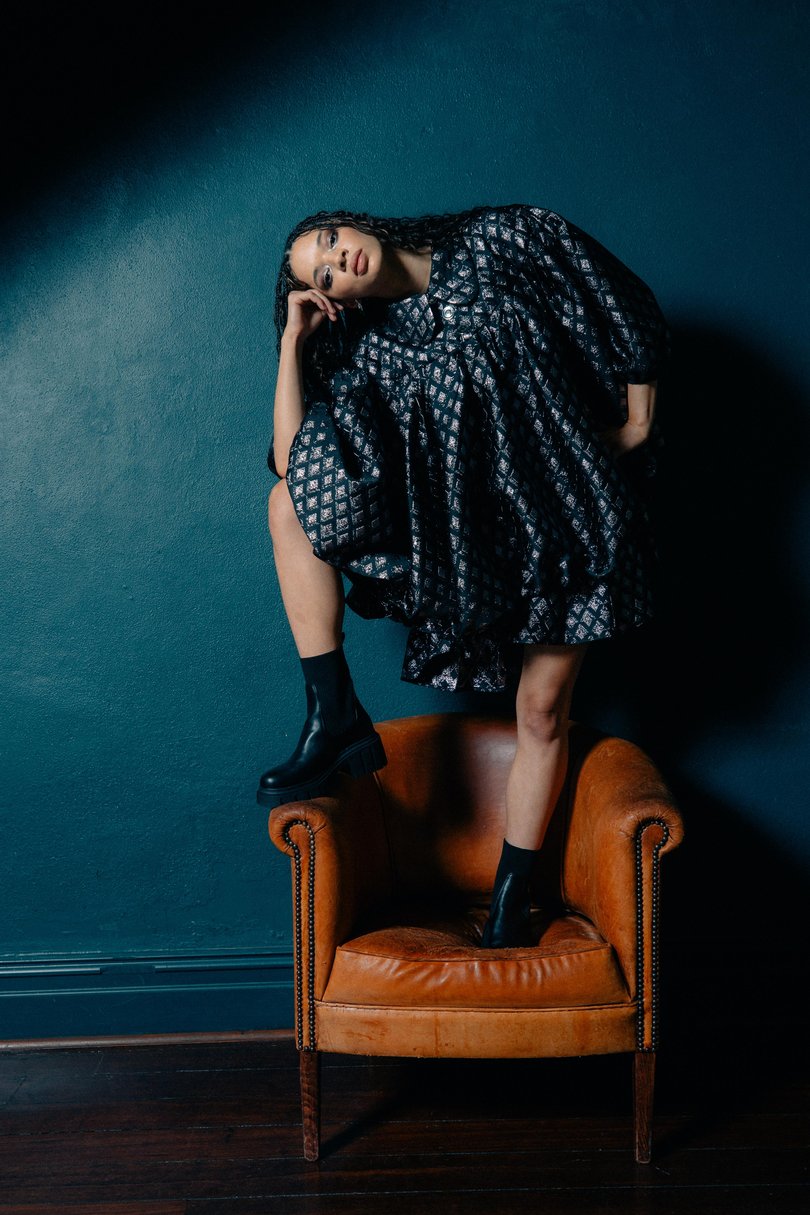 Tanzyn Crawford is pictured at Guildhall in North Fremantle, wearing clothing from emerging WA designer Monique Tuffnell. 