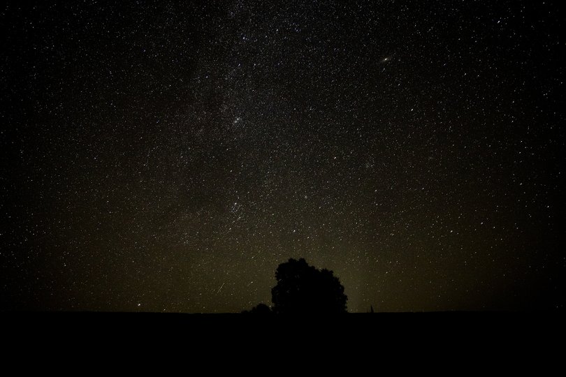 The night sky above a beach in Gay, Michigan, where mining companies dumped waste rock known as stamp sands in and around Lake Superior, September 13, 2025.