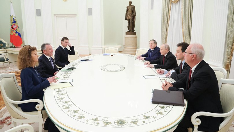 In this pool photograph distributed by the Russian state agency Sputnik, Russia's President Vladimir Putin, accompanied by Kremlin economic envoy Kirill Dmitriev and Kremlin aide Yuri Ushakov, meets with US special envoy Steve Witkoff and US President Donald Trump's son-in-law Jared Kushner at the Kremlin in Moscow on December 2, 2025.