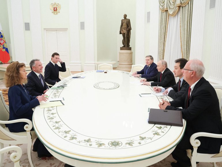 In this pool photograph distributed by the Russian state agency Sputnik, Russia's President Vladimir Putin, accompanied by Kremlin economic envoy Kirill Dmitriev and Kremlin aide Yuri Ushakov, meets with US special envoy Steve Witkoff and US President Donald Trump's son-in-law Jared Kushner at the Kremlin in Moscow on December 2, 2025.
