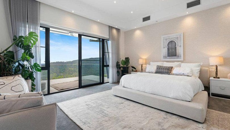 One of the five bedrooms.