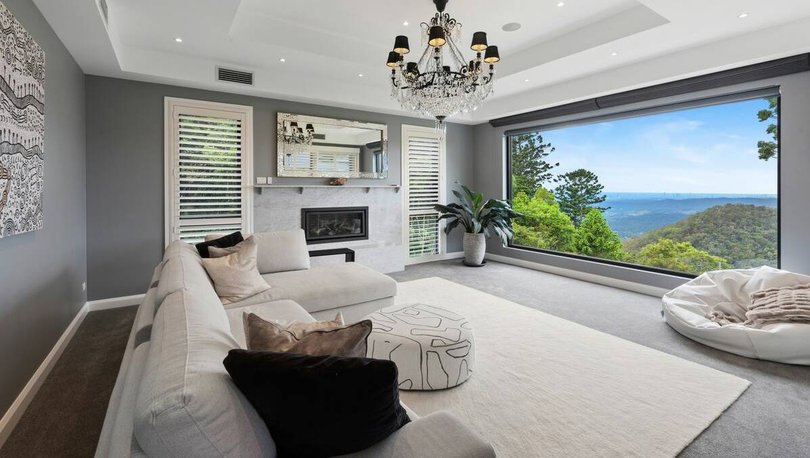 The home has uninterrupted panoramic views of Tamborine National Park.