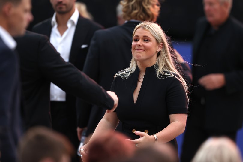 MELBOURNE, AUSTRALIA - MARCH 30: Brooke Warne hugs family and friends during the state memorial service for former Australian cricketer Shane Warne at the Melbourne Cricket Ground on March 30, 2022 in Melbourne, Australia. Warne died suddenly aged 52 on Friday 4 March while on holiday in Thailand. (Photo by Robert Cianflone/Getty Images)