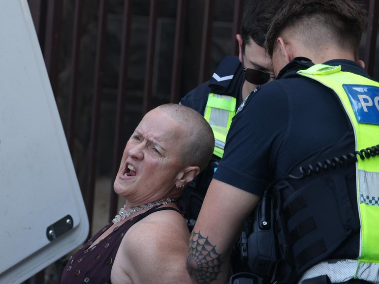 A protester allegedly glued herself to furniture inside the public gallery at Victoria’s parliament to rant at Premier Jacinta Allen.
