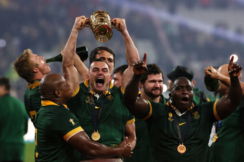 Jesse Kriel of South Africa  celebrates victory with team mates after the Rugby World Cup France 2023 Final match between New Zealand and South Africa at Stade de France,