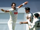 Mitchell Starc celebrates dismissing Ben Duckett.