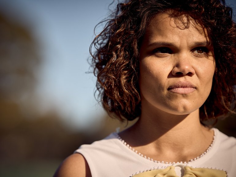 Lila McGuire as Evonne Goolagong.