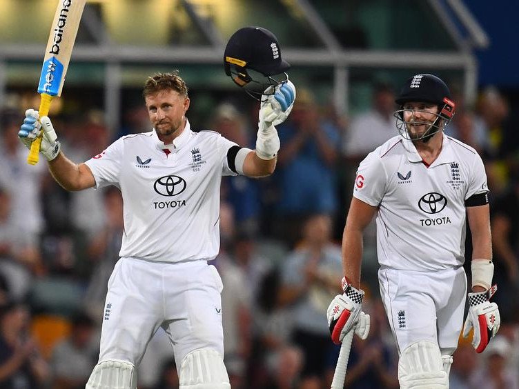 England stalwart Joe Root raises his bat after finally scoring a Test century in Australia.  