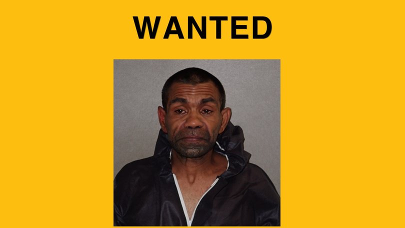 A huge police search is under way for a man who escaped police custody while handcuffed in a major Aussie city.