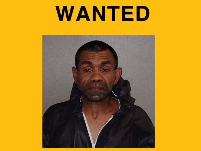 A huge police search is under way for a man who escaped police custody while handcuffed in a major Aussie city.