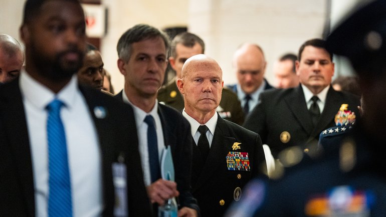 Admiral Frank Bradley makes his way to a classified meeting with lawmakers on Capitol Hill on Thursday.