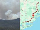 The M1 Pacific Highway has been shut in both directions as firefighters battle a grass and bushfire.