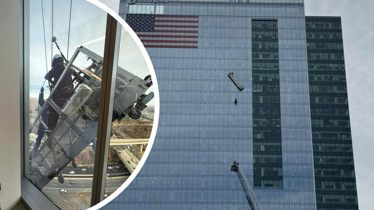 Virginia: Window washers dangle 15 stories high from Tysons One Place ...