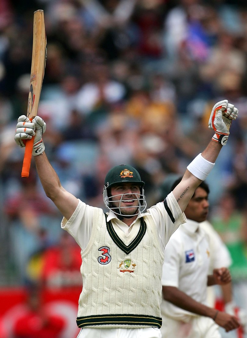 Damien Martyn of Australia celebrates scoring a century during day three of the Second Test between Australia and Pakistan played at the MCG on December 28, 2004 in Melbourne, Australia.