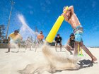 Australia Day 2022. City Beach. 13 year-old Oliver Clark plays beach cricket with (counter clockwise from batsman) Michael Snelling, Jack Gallagher, Travis Bestwick, Oscar Coyle, Elliott Comito Simon Santi