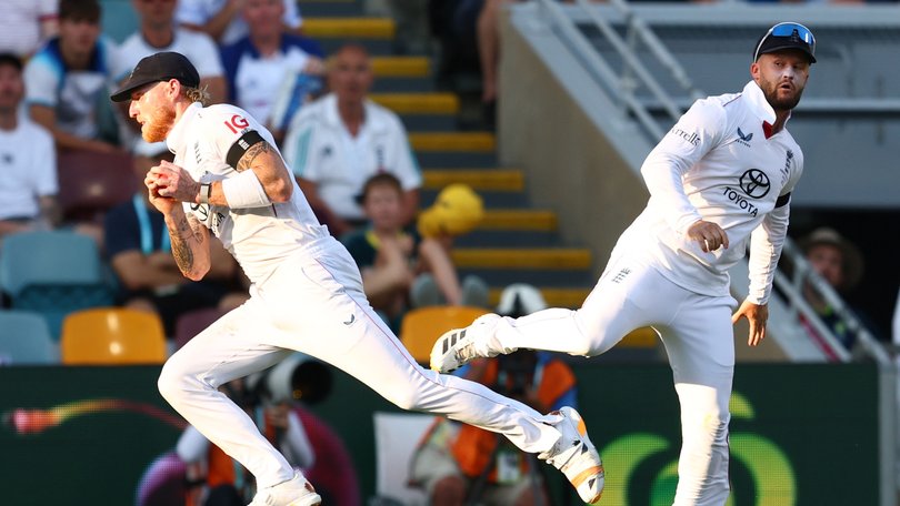 Ben Stokes of England takes a catch to dismiss Mitchell Starc.